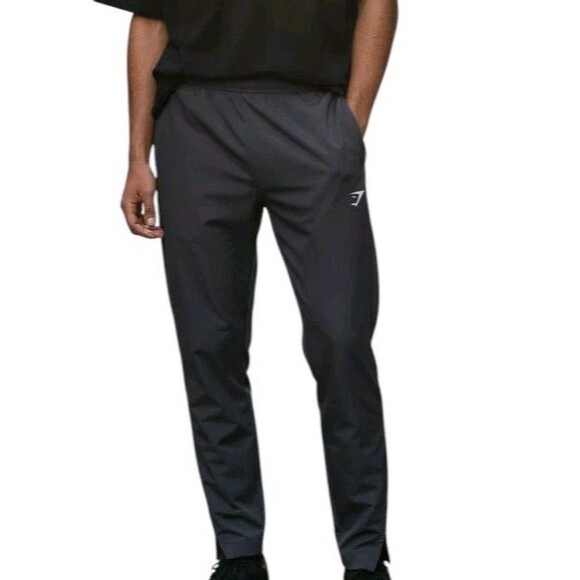 Gymshark Pants Mens Medium Grey Arrival Woven Joggers Zip Ankle Drawstring - Picture 1 of 11